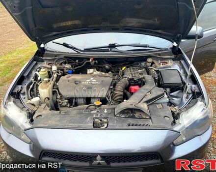 Сірий Міцубісі Lancer, об'ємом двигуна 2 л та пробігом 168 тис. км за 8000 $, фото 4 на Automoto.ua