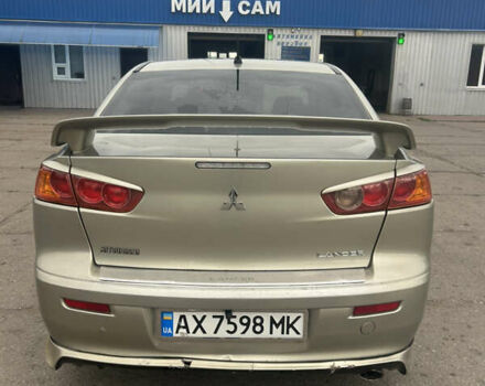 Серый Мицубиси Лансер, объемом двигателя 2 л и пробегом 227 тыс. км за 5850 $, фото 4 на Automoto.ua