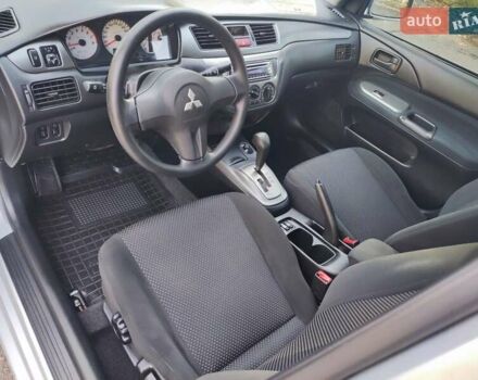 Сірий Міцубісі Lancer, об'ємом двигуна 1.58 л та пробігом 122 тис. км за 6300 $, фото 36 на Automoto.ua