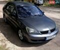 Сірий Міцубісі Lancer, об'ємом двигуна 2 л та пробігом 302 тис. км за 4700 $, фото 1 на Automoto.ua