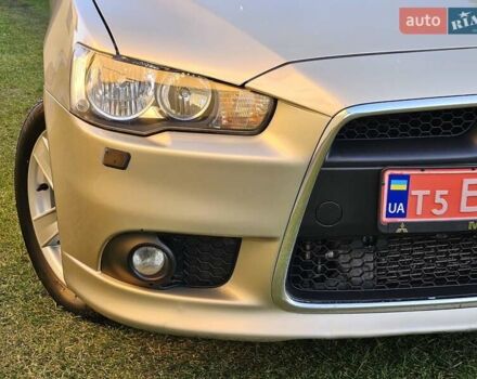 Серый Мицубиси Лансер, объемом двигателя 2 л и пробегом 282 тыс. км за 5450 $, фото 24 на Automoto.ua