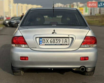 Серый Мицубиси Лансер, объемом двигателя 1.3 л и пробегом 160 тыс. км за 5555 $, фото 16 на Automoto.ua