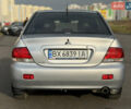 Серый Мицубиси Лансер, объемом двигателя 1.3 л и пробегом 160 тыс. км за 5555 $, фото 16 на Automoto.ua