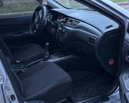 Сірий Міцубісі Lancer, об'ємом двигуна 1.6 л та пробігом 210 тис. км за 4750 $, фото 7 на Automoto.ua
