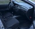 Сірий Міцубісі Lancer, об'ємом двигуна 1.6 л та пробігом 210 тис. км за 4750 $, фото 7 на Automoto.ua