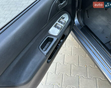Сірий Міцубісі Lancer, об'ємом двигуна 1.6 л та пробігом 189 тис. км за 6200 $, фото 15 на Automoto.ua