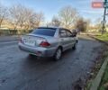 Сірий Міцубісі Lancer, об'ємом двигуна 1.58 л та пробігом 235 тис. км за 5200 $, фото 5 на Automoto.ua