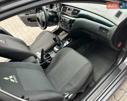 Сірий Міцубісі Lancer, об'ємом двигуна 1.6 л та пробігом 115 тис. км за 2800 $, фото 15 на Automoto.ua