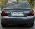 Серый Мицубиси Лансер, объемом двигателя 1.6 л и пробегом 220 тыс. км за 3199 $, фото 3 на Automoto.ua