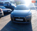 Сірий Міцубісі Lancer, об'ємом двигуна 2.01 л та пробігом 222 тис. км за 7000 $, фото 5 на Automoto.ua
