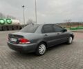 Сірий Міцубісі Lancer, об'ємом двигуна 1.6 л та пробігом 253 тис. км за 3100 $, фото 2 на Automoto.ua