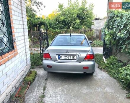 Сірий Міцубісі Lancer, об'ємом двигуна 0 л та пробігом 270 тис. км за 4950 $, фото 10 на Automoto.ua