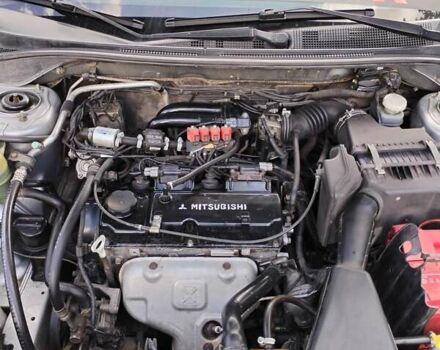Сірий Міцубісі Lancer, об'ємом двигуна 1.6 л та пробігом 290 тис. км за 4600 $, фото 4 на Automoto.ua