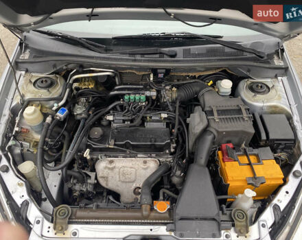 Серый Мицубиси Лансер, объемом двигателя 1.58 л и пробегом 240 тыс. км за 5500 $, фото 4 на Automoto.ua