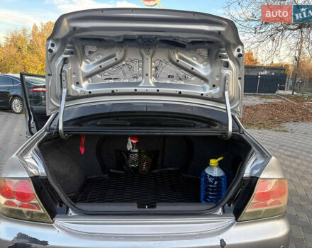 Серый Мицубиси Лансер, объемом двигателя 2 л и пробегом 184 тыс. км за 4900 $, фото 7 на Automoto.ua