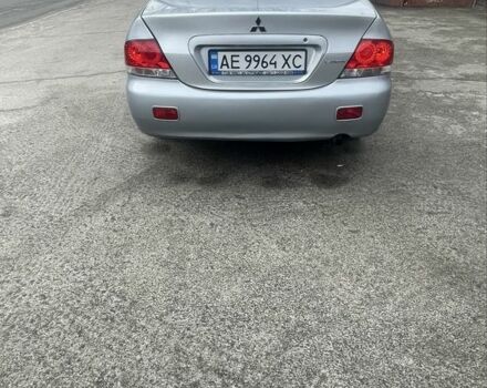 Сірий Міцубісі Lancer, об'ємом двигуна 1.6 л та пробігом 200 тис. км за 4200 $, фото 1 на Automoto.ua