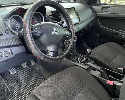 Серый Мицубиси Лансер, объемом двигателя 2 л и пробегом 244 тыс. км за 6500 $, фото 5 на Automoto.ua