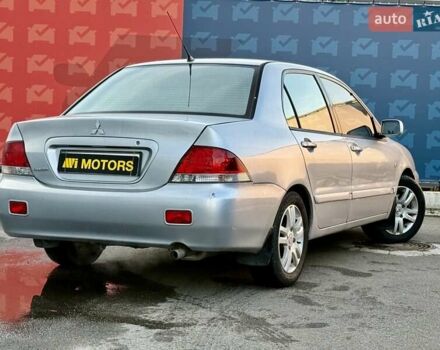 Сірий Міцубісі Lancer, об'ємом двигуна 1.6 л та пробігом 395 тис. км за 4900 $, фото 2 на Automoto.ua