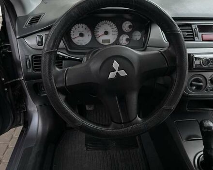 Сірий Міцубісі Lancer, об'ємом двигуна 1.6 л та пробігом 330 тис. км за 3500 $, фото 12 на Automoto.ua