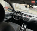 Сірий Міцубісі Lancer, об'ємом двигуна 1.6 л та пробігом 281 тис. км за 3999 $, фото 19 на Automoto.ua