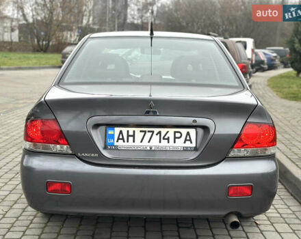 Сірий Міцубісі Lancer, об'ємом двигуна 1.6 л та пробігом 177 тис. км за 2800 $, фото 5 на Automoto.ua