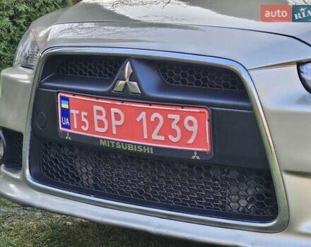Серый Мицубиси Лансер, объемом двигателя 2 л и пробегом 282 тыс. км за 5450 $, фото 26 на Automoto.ua