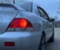 Сірий Міцубісі Lancer, об'ємом двигуна 1.6 л та пробігом 210 тис. км за 4750 $, фото 4 на Automoto.ua