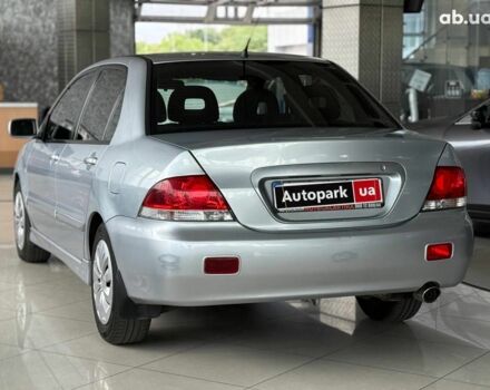 Серый Мицубиси Лансер, объемом двигателя 1.6 л и пробегом 174 тыс. км за 5990 $, фото 6 на Automoto.ua