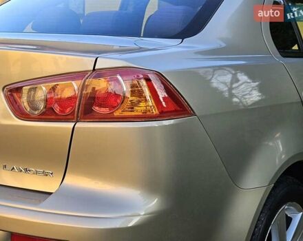 Серый Мицубиси Лансер, объемом двигателя 2 л и пробегом 282 тыс. км за 5450 $, фото 37 на Automoto.ua