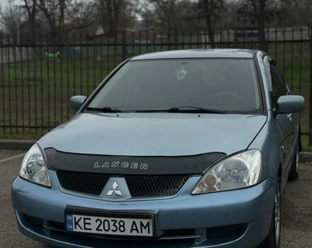 Серый Мицубиси Лансер, объемом двигателя 1.6 л и пробегом 238 тыс. км за 4400 $, фото 3 на Automoto.ua