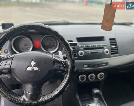 Серый Мицубиси Лансер, объемом двигателя 2 л и пробегом 286 тыс. км за 5800 $, фото 12 на Automoto.ua