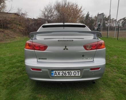 Серый Мицубиси Лансер, объемом двигателя 2 л и пробегом 124 тыс. км за 7499 $, фото 3 на Automoto.ua