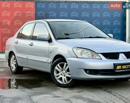 Сірий Міцубісі Lancer, об'ємом двигуна 1.6 л та пробігом 395 тис. км за 4900 $, фото 7 на Automoto.ua