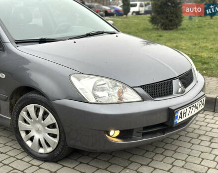 Сірий Міцубісі Lancer, об'ємом двигуна 1.6 л та пробігом 177 тис. км за 2800 $, фото 14 на Automoto.ua