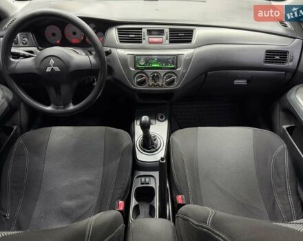 Серый Мицубиси Лансер, объемом двигателя 1.58 л и пробегом 271 тыс. км за 4200 $, фото 24 на Automoto.ua