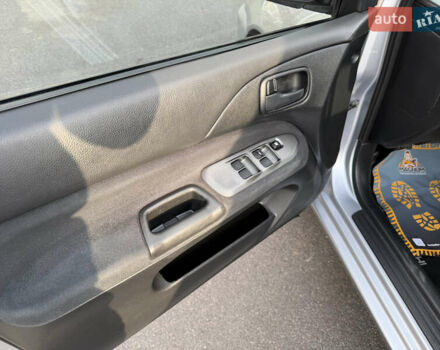 Сірий Міцубісі Lancer, об'ємом двигуна 1.3 л та пробігом 160 тис. км за 4999 $, фото 36 на Automoto.ua