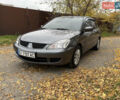 Сірий Міцубісі Lancer, об'ємом двигуна 1.58 л та пробігом 247 тис. км за 4900 $, фото 15 на Automoto.ua
