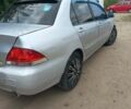Сірий Міцубісі Lancer, об'ємом двигуна 1.58 л та пробігом 416 тис. км за 3100 $, фото 11 на Automoto.ua