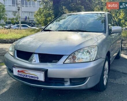 Сірий Міцубісі Lancer, об'ємом двигуна 1.58 л та пробігом 138 тис. км за 4990 $, фото 5 на Automoto.ua