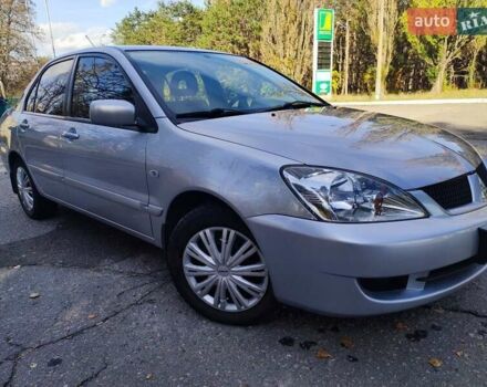 Сірий Міцубісі Lancer, об'ємом двигуна 1.58 л та пробігом 122 тис. км за 6300 $, фото 15 на Automoto.ua