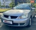 Сірий Міцубісі Lancer, об'ємом двигуна 1.58 л та пробігом 138 тис. км за 4990 $, фото 5 на Automoto.ua