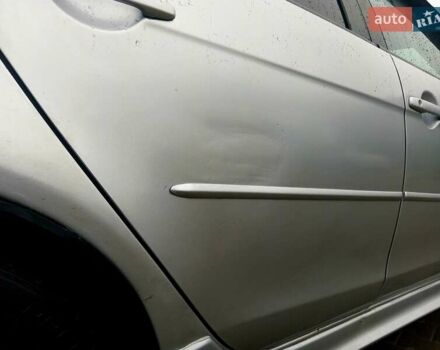 Сірий Міцубісі Lancer, об'ємом двигуна 2 л та пробігом 268 тис. км за 5555 $, фото 1 на Automoto.ua