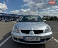 Сірий Міцубісі Lancer, об'ємом двигуна 1.59 л та пробігом 288 тис. км за 4500 $, фото 5 на Automoto.ua