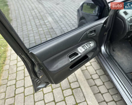 Сірий Міцубісі Lancer, об'ємом двигуна 1.6 л та пробігом 177 тис. км за 2800 $, фото 18 на Automoto.ua