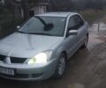 Сірий Міцубісі Lancer, об'ємом двигуна 1.6 л та пробігом 178 тис. км за 3500 $, фото 1 на Automoto.ua