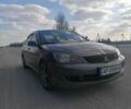 Сірий Міцубісі Lancer, об'ємом двигуна 2 л та пробігом 155 тис. км за 5000 $, фото 1 на Automoto.ua