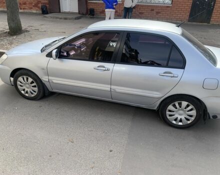 Сірий Міцубісі Lancer, об'ємом двигуна 1.6 л та пробігом 332 тис. км за 3200 $, фото 6 на Automoto.ua