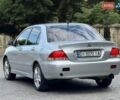 Серый Мицубиси Лансер, объемом двигателя 1.58 л и пробегом 241 тыс. км за 3750 $, фото 12 на Automoto.ua
