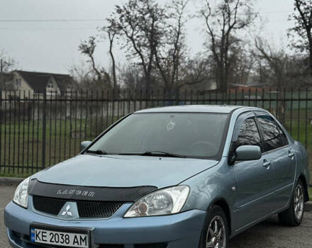 Серый Мицубиси Лансер, объемом двигателя 1.6 л и пробегом 238 тыс. км за 4400 $, фото 5 на Automoto.ua
