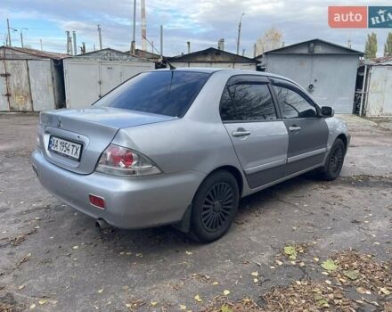Сірий Міцубісі Lancer, об'ємом двигуна 1.58 л та пробігом 305 тис. км за 3300 $, фото 4 на Automoto.ua